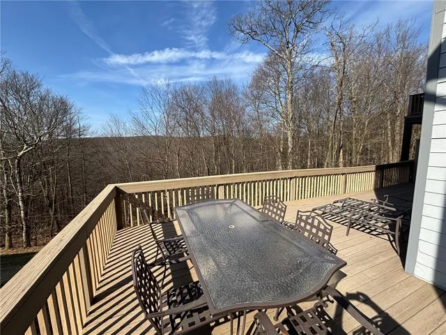 a view of balcony and wooden floor