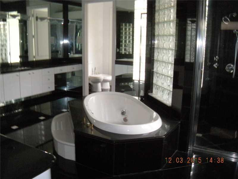 3712 Northwest 52nd Street Boca Raton, FL 33496 - Photo 5 of 6 Bathroom Master.