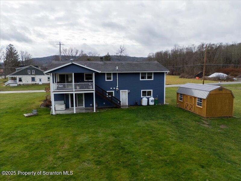 895 Cemetery Road Little Meadows, PA 18830 - Photo 3 of 40 a view of a house with a backyard