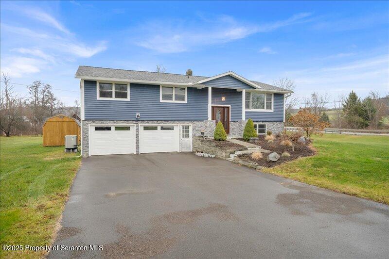 895 Cemetery Road Little Meadows, PA 18830 - Photo 40 of 40 a view of a house with backyard and garden