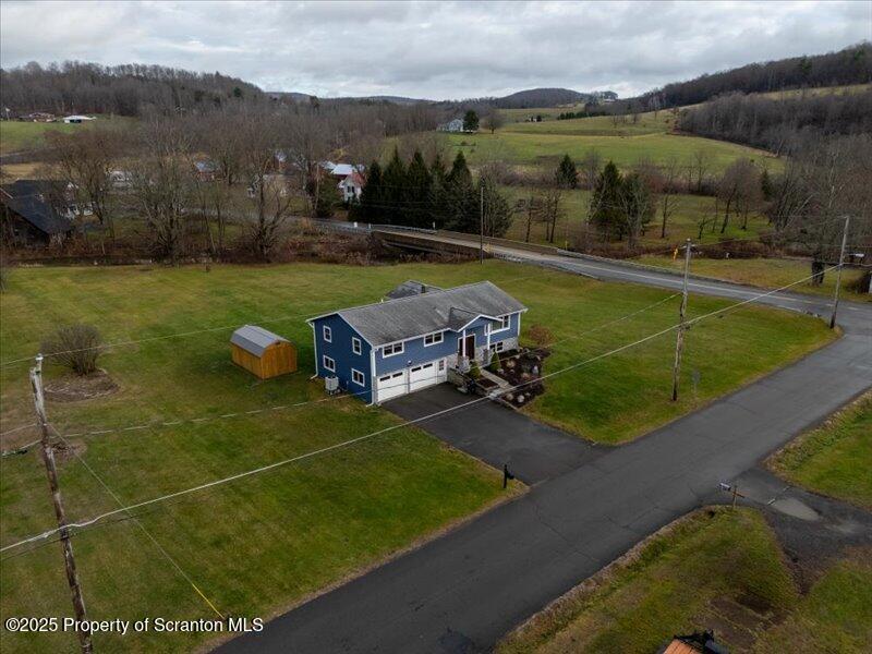 895 Cemetery Road Little Meadows, PA 18830 - Photo 6 of 40 a view of a swimming pool with a yard