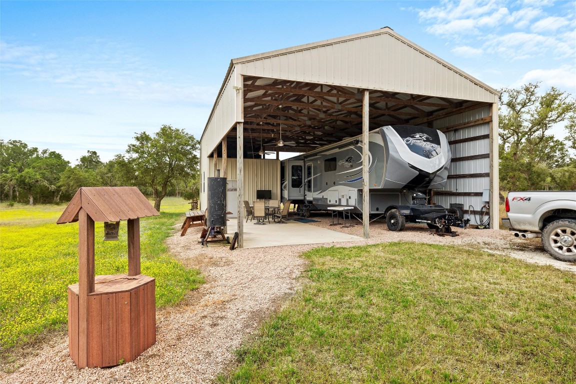 426 Preiss Ranch Road Blanco, TX 78606 - Photo 23 of 40 a view of a garden with sitting area