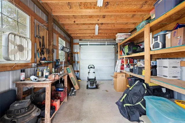 a view of a lake with a yard