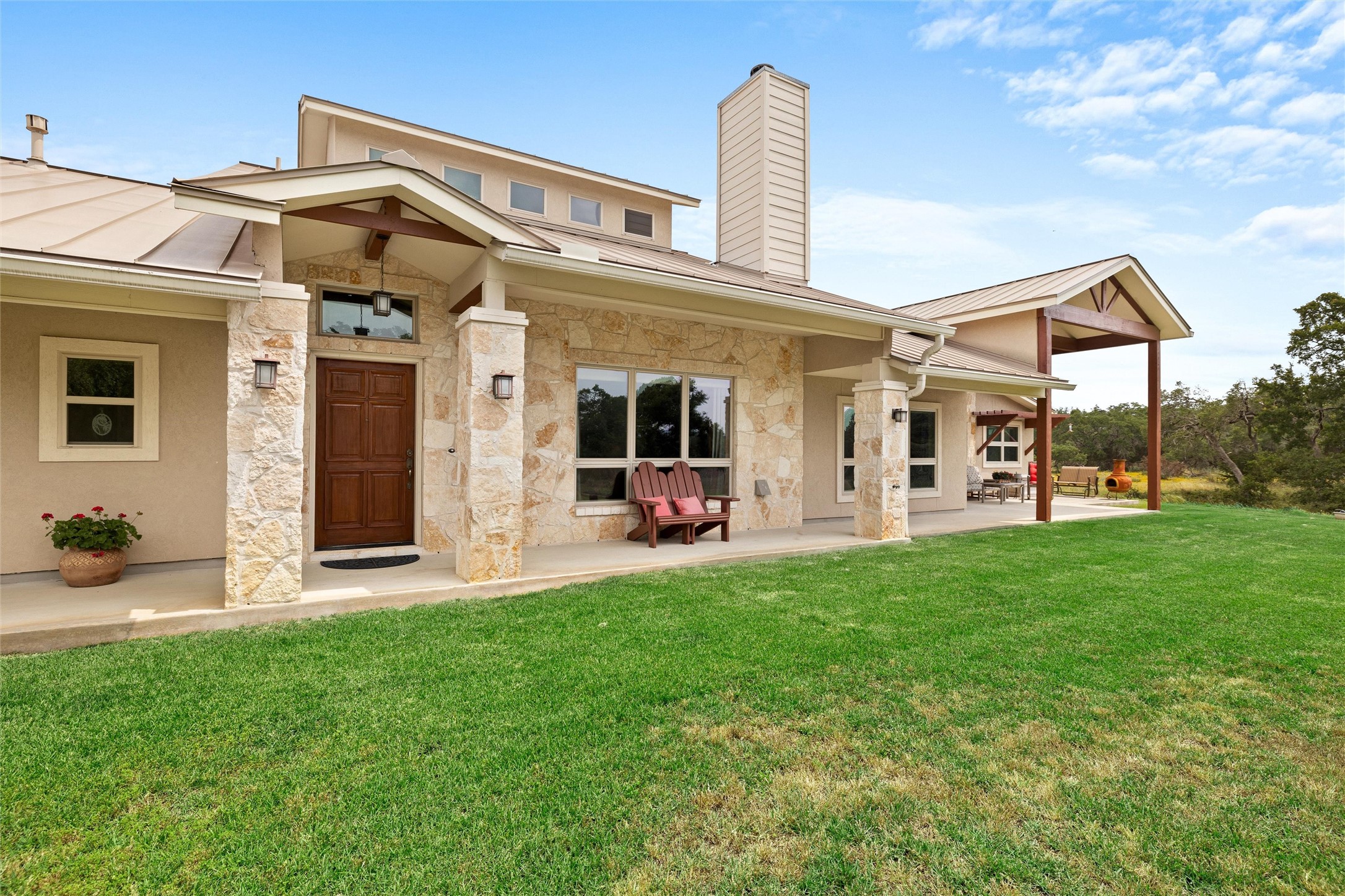 426 Preiss Ranch Road Blanco, TX 78606 - Photo 7 of 40 a view of a house with a backyard