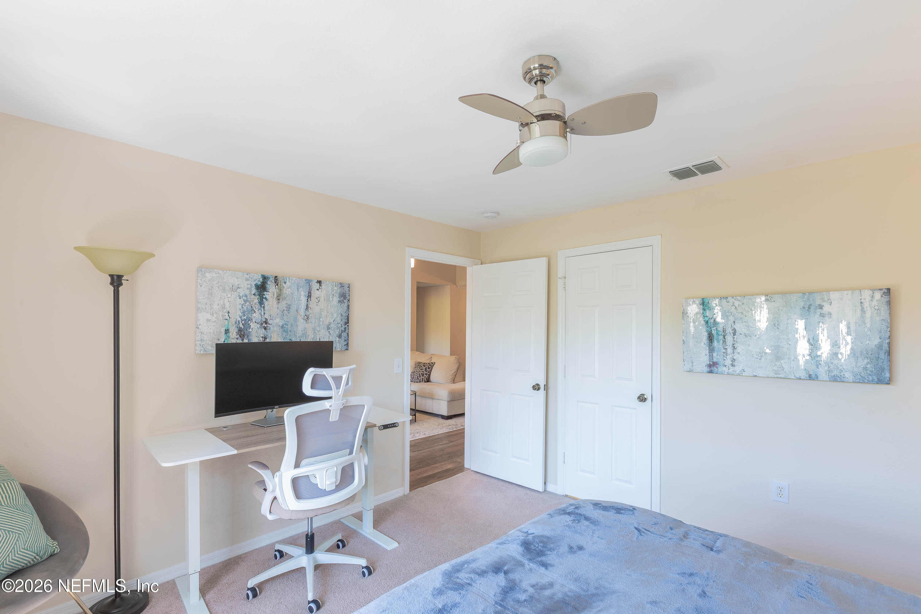 10961 Burnt Mill Road, Unit 734 Jacksonville, FL 32256 - Photo 12 of 35 a view of a workspace with furniture and a window