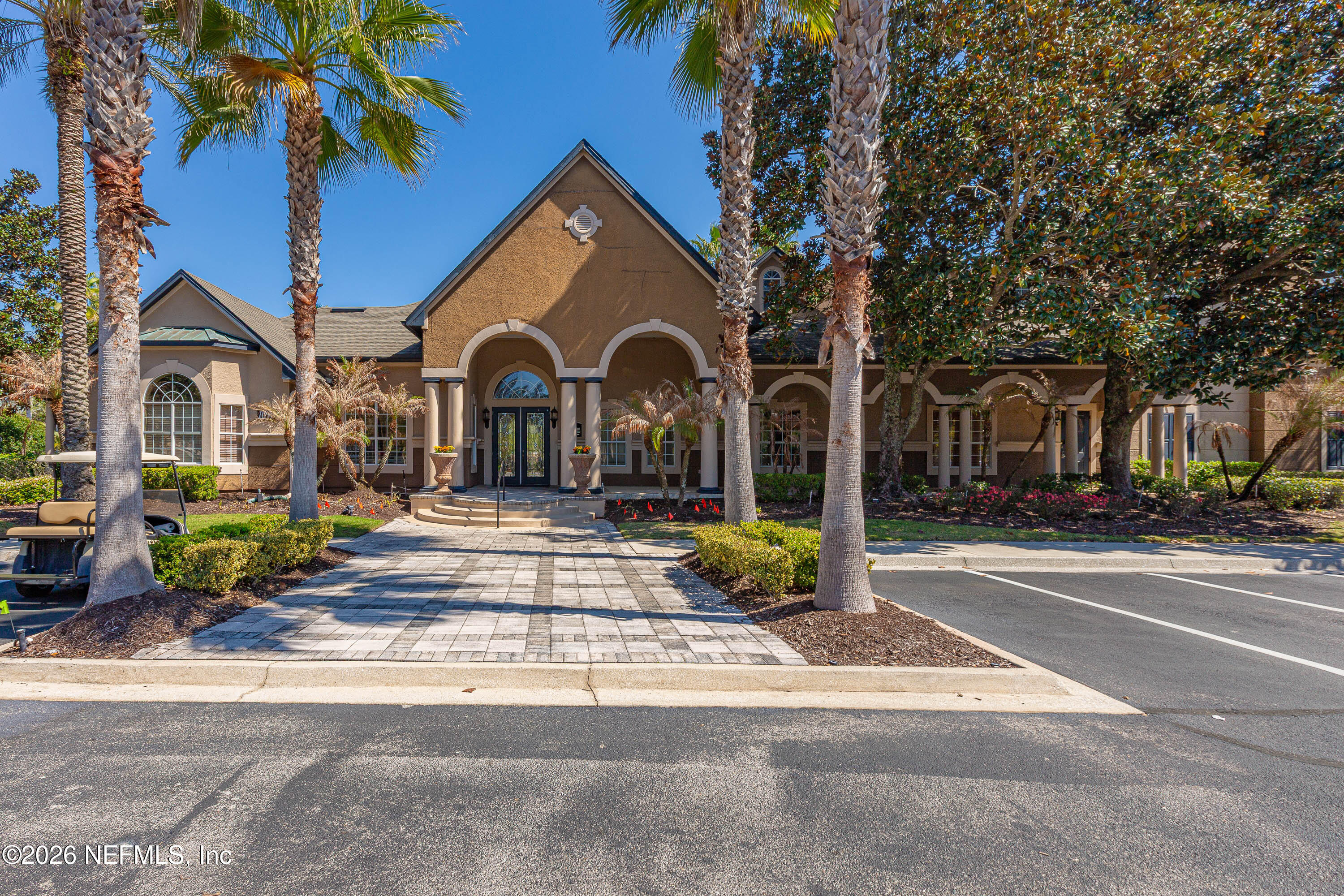 10961 Burnt Mill Road, Unit 734 Jacksonville, FL 32256 - Photo 26 of 35 a view of a house with a yard