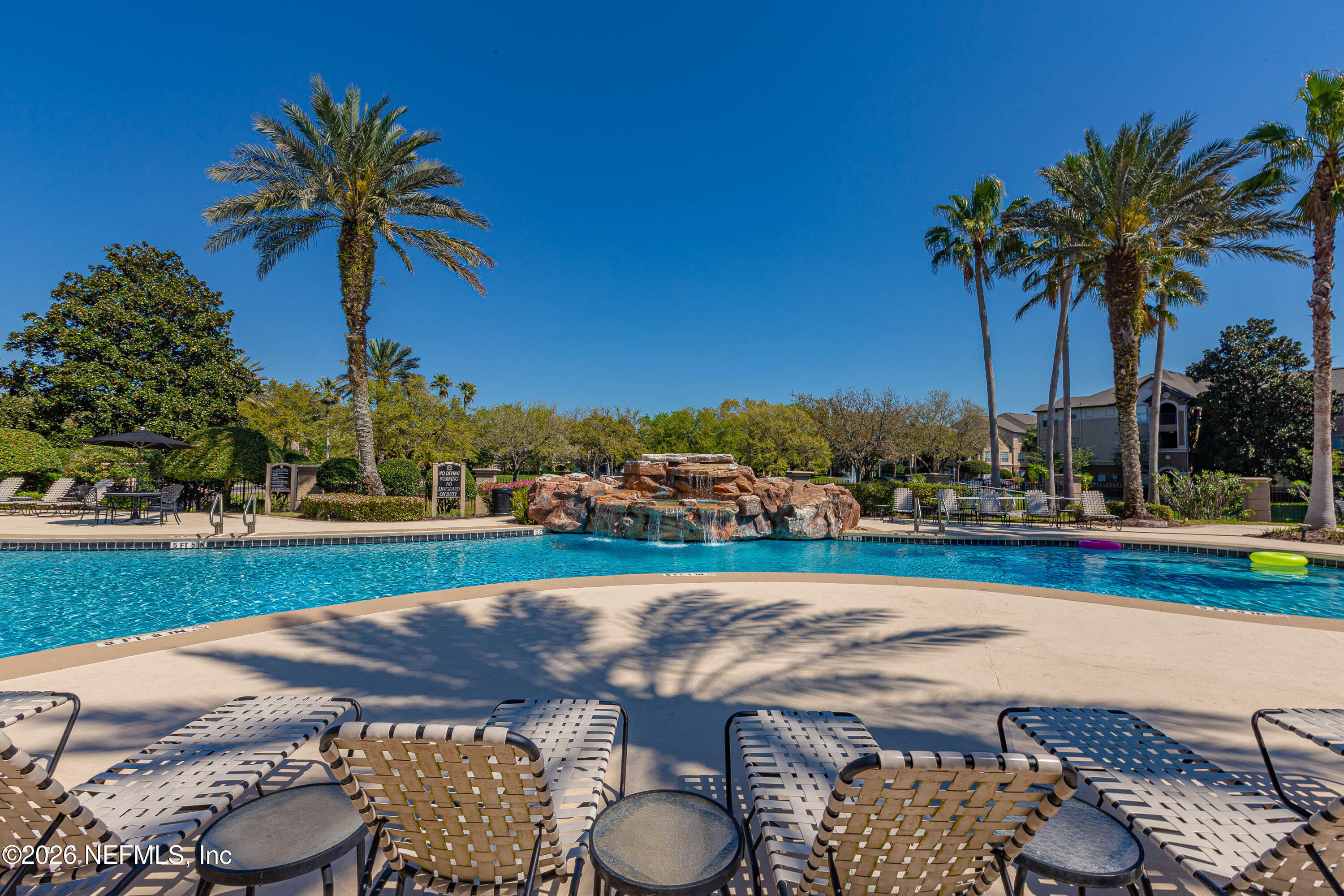10961 Burnt Mill Road, Unit 734 Jacksonville, FL 32256 - Photo 29 of 35 a view of swimming pool and lake view