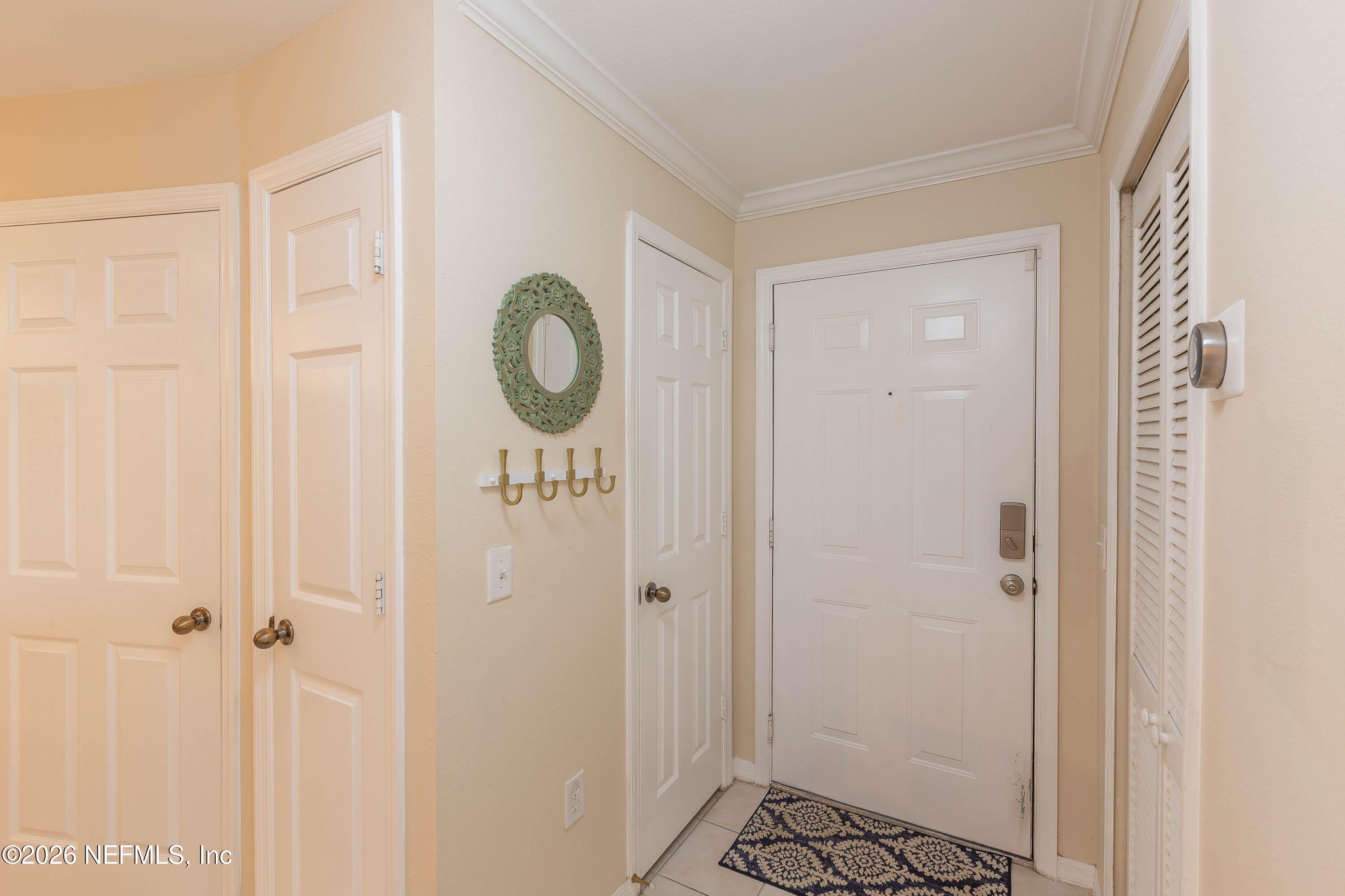10961 Burnt Mill Road, Unit 734 Jacksonville, FL 32256 - Photo 4 of 35 a bathroom with a shower and a sink