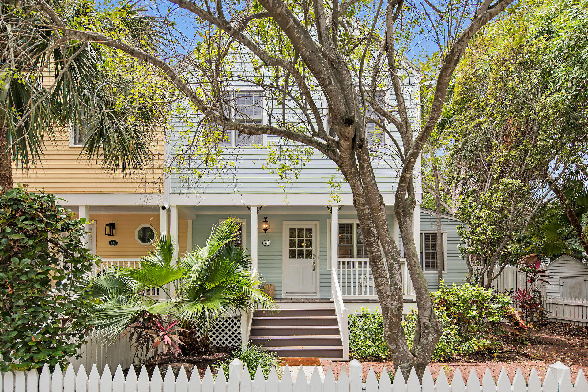 front view of a house with a garden