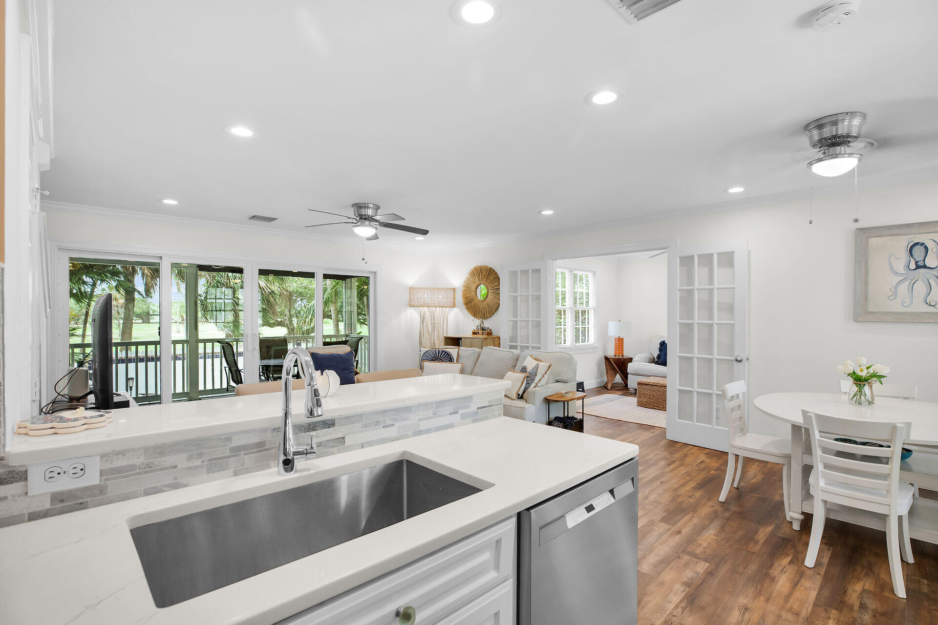 60 Golf Club Drive Key West, FL 33040 - Photo 12 of 42 a kitchen with sink and view of living room