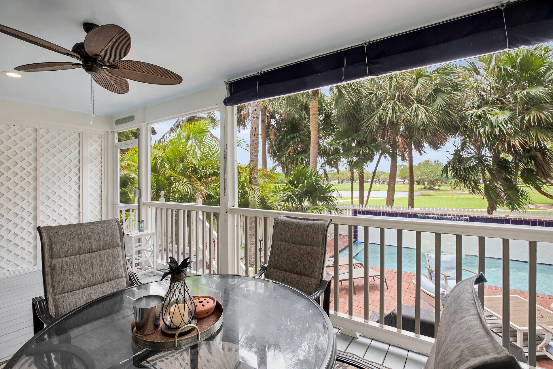 60 Golf Club Drive Key West, FL 33040 - Photo 20 of 42 a view of a porch with furniture