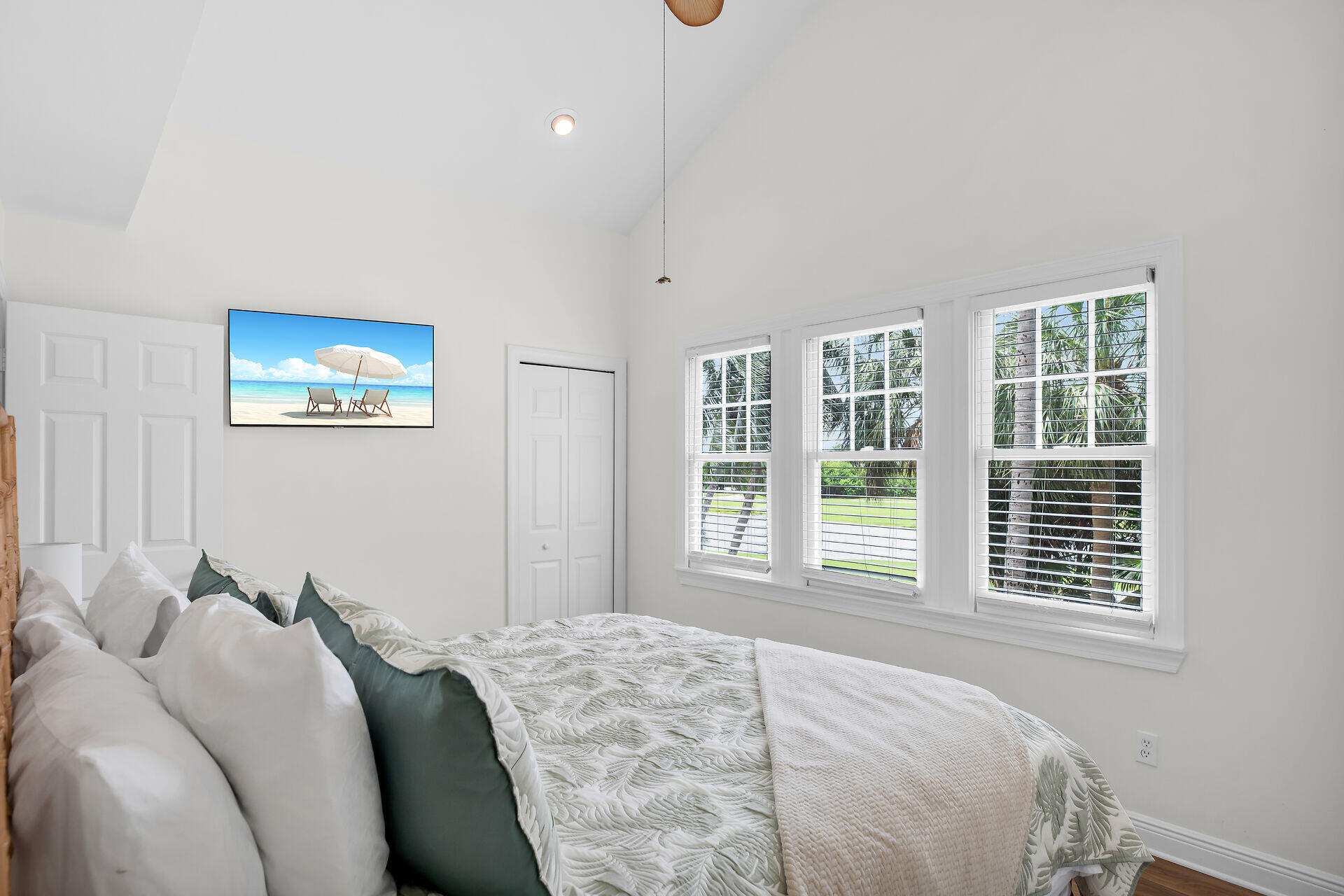 60 Golf Club Drive Key West, FL 33040 - Photo 24 of 42 a bed sitting in a bedroom next to a window