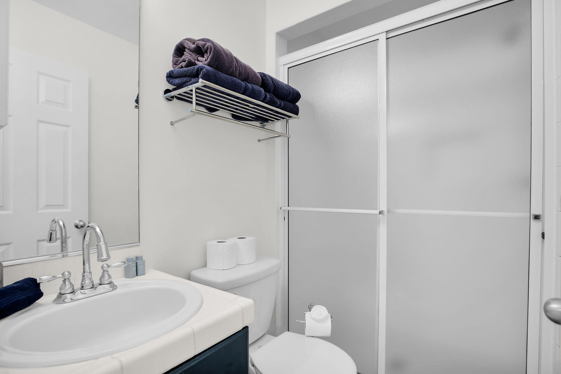 60 Golf Club Drive Key West, FL 33040 - Photo 28 of 42 a bathroom with a sink a toilet and shower