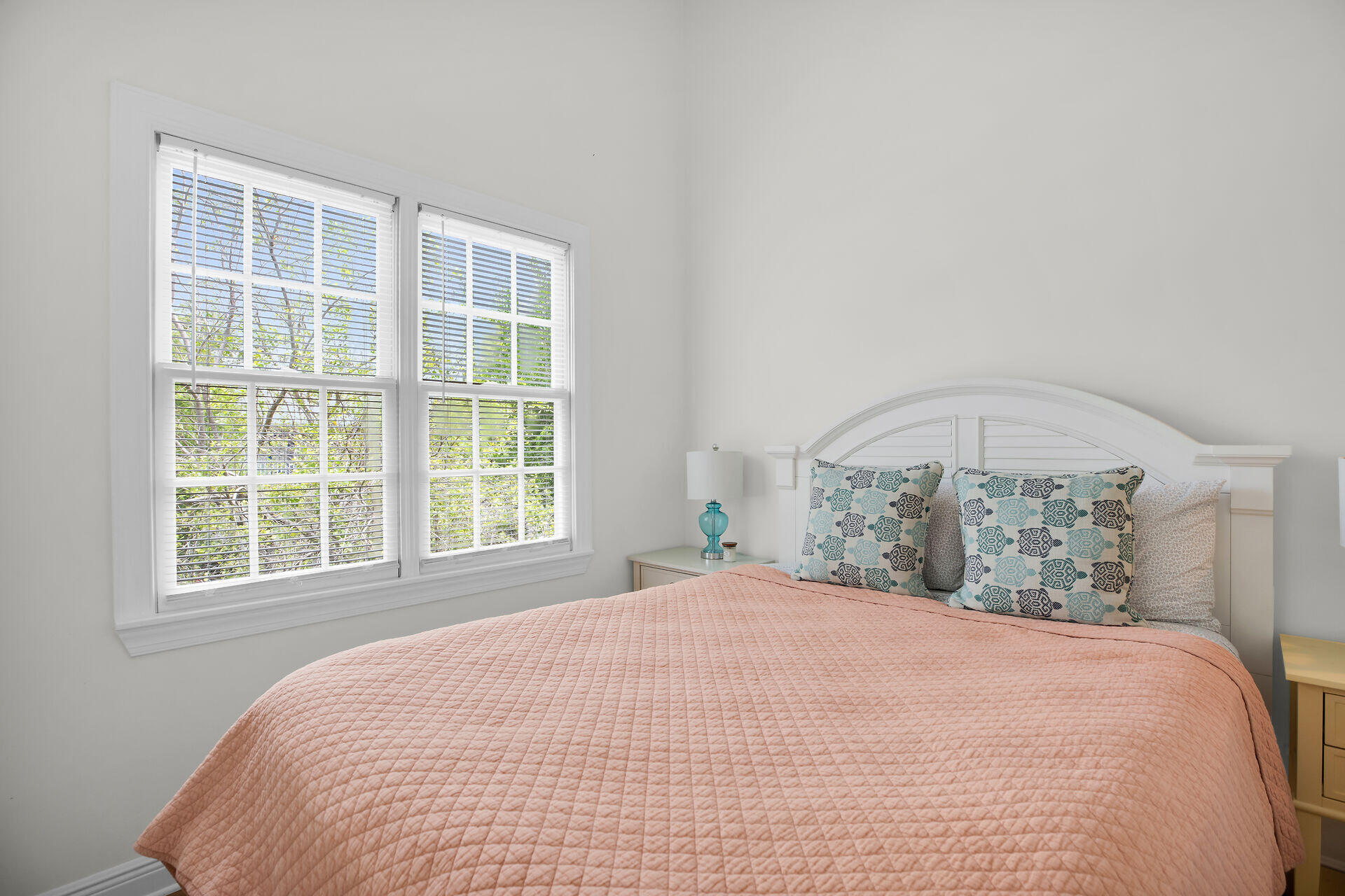 60 Golf Club Drive Key West, FL 33040 - Photo 30 of 42 a large bed sitting in a bedroom next to a window