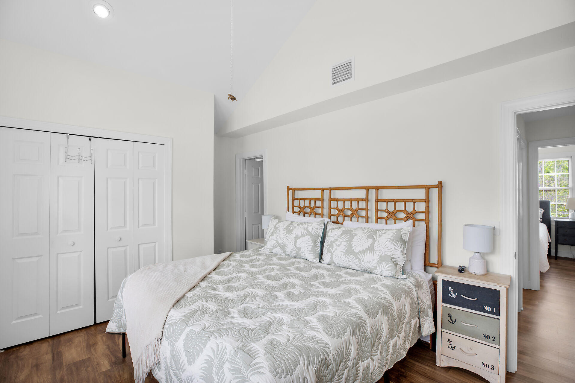 60 Golf Club Drive Key West, FL 33040 - Photo 37 of 42 a bedroom with a bed and a night stand