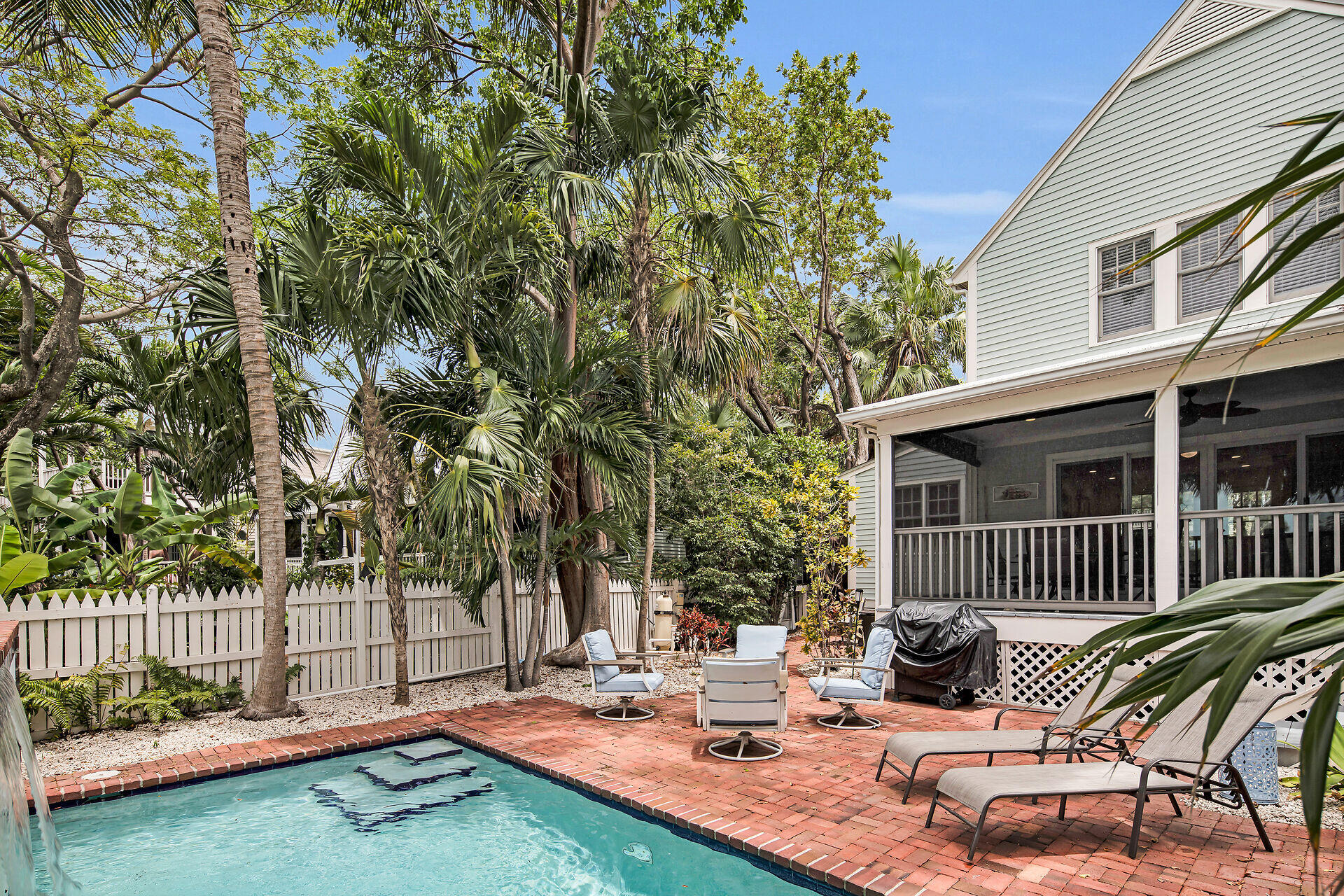 60 Golf Club Drive Key West, FL 33040 - Photo 4 of 42 a view of backyard with deck and outdoor seating