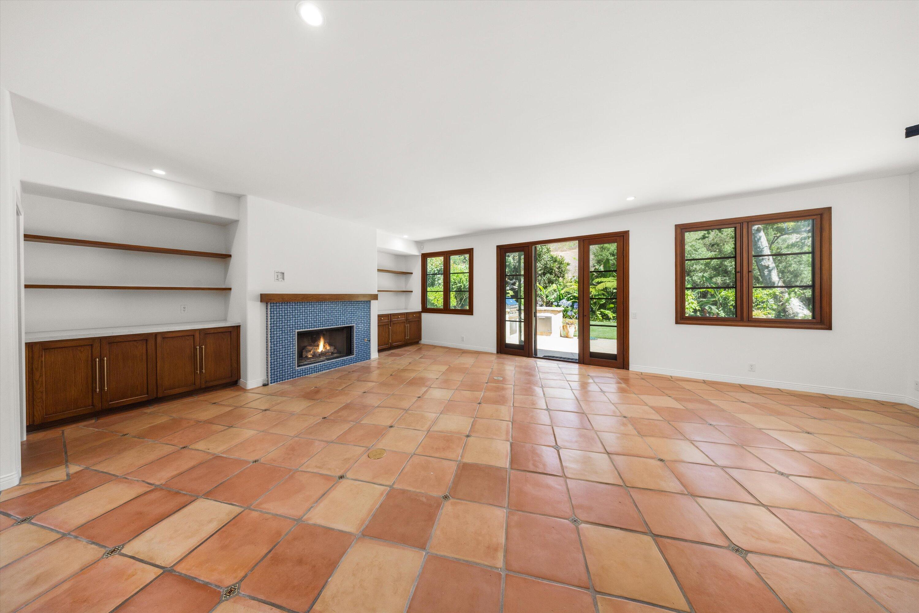 342 Sheffield Drive Montecito, CA 93108 - Photo 16 of 46 a view of empty room with a fireplace and window