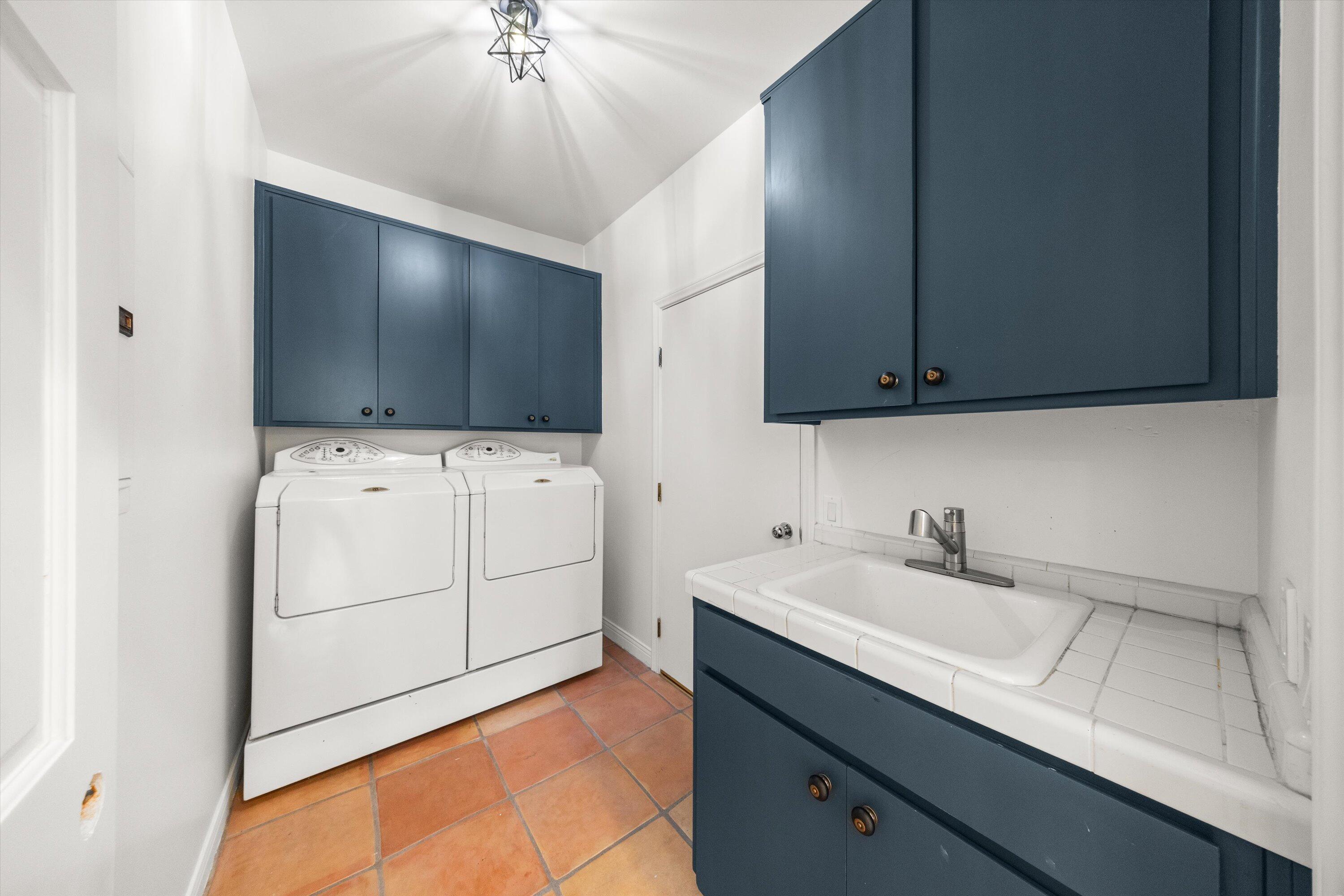 342 Sheffield Drive Montecito, CA 93108 - Photo 17 of 46 a bathroom with a sink and a mirror