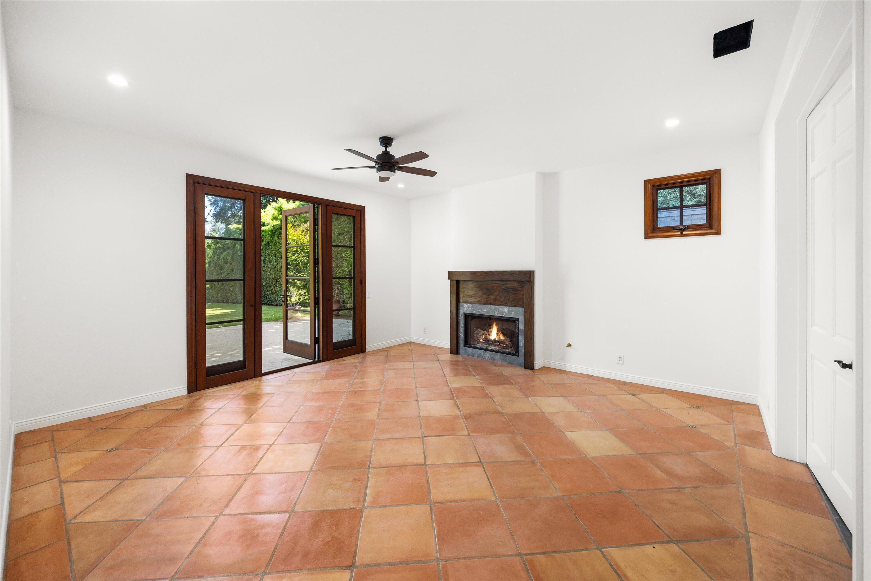 342 Sheffield Drive Montecito, CA 93108 - Photo 19 of 46 a view of an empty room with a fireplace