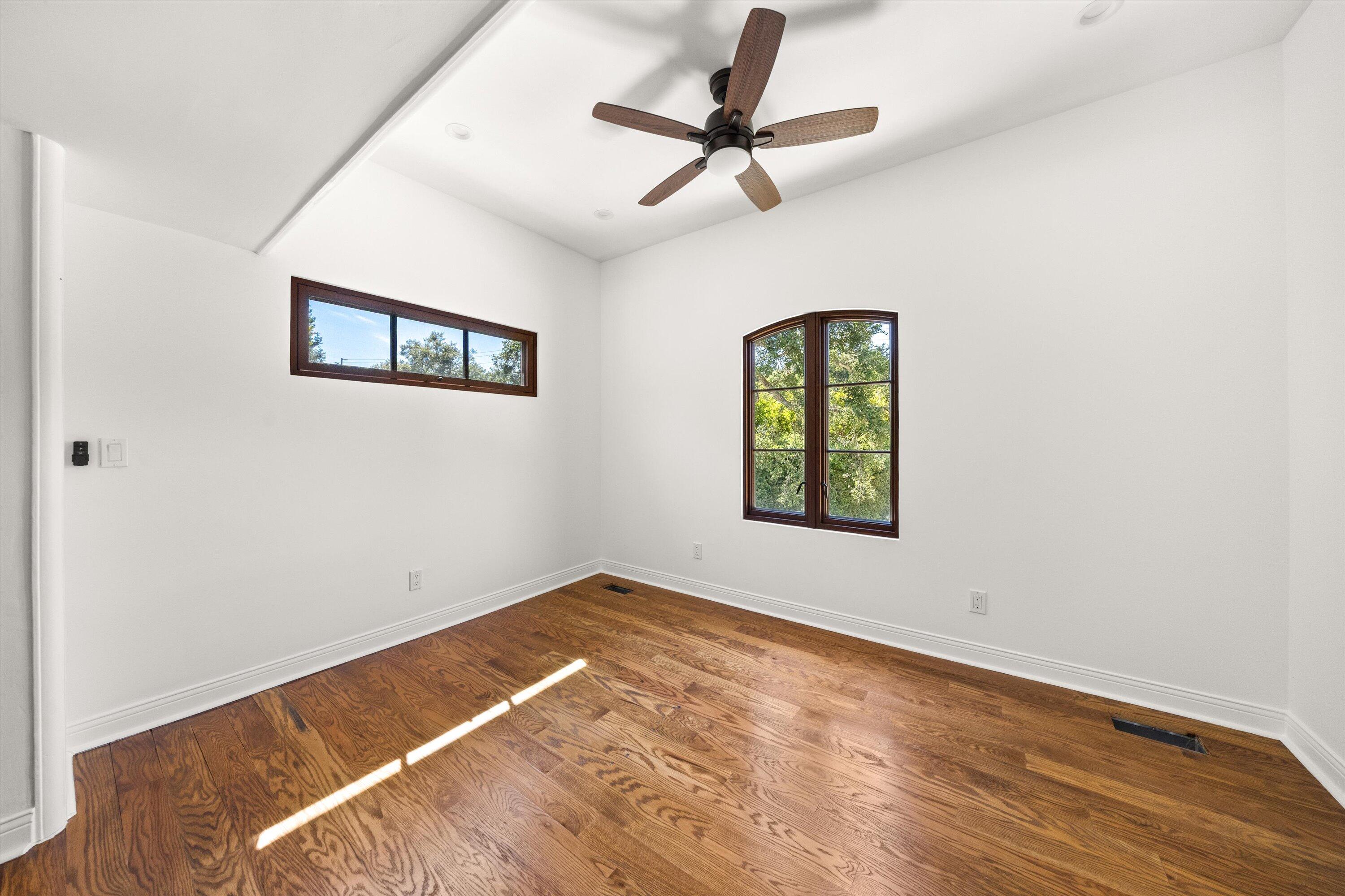 342 Sheffield Drive Montecito, CA 93108 - Photo 24 of 46 an empty room with a window and ceiling fan