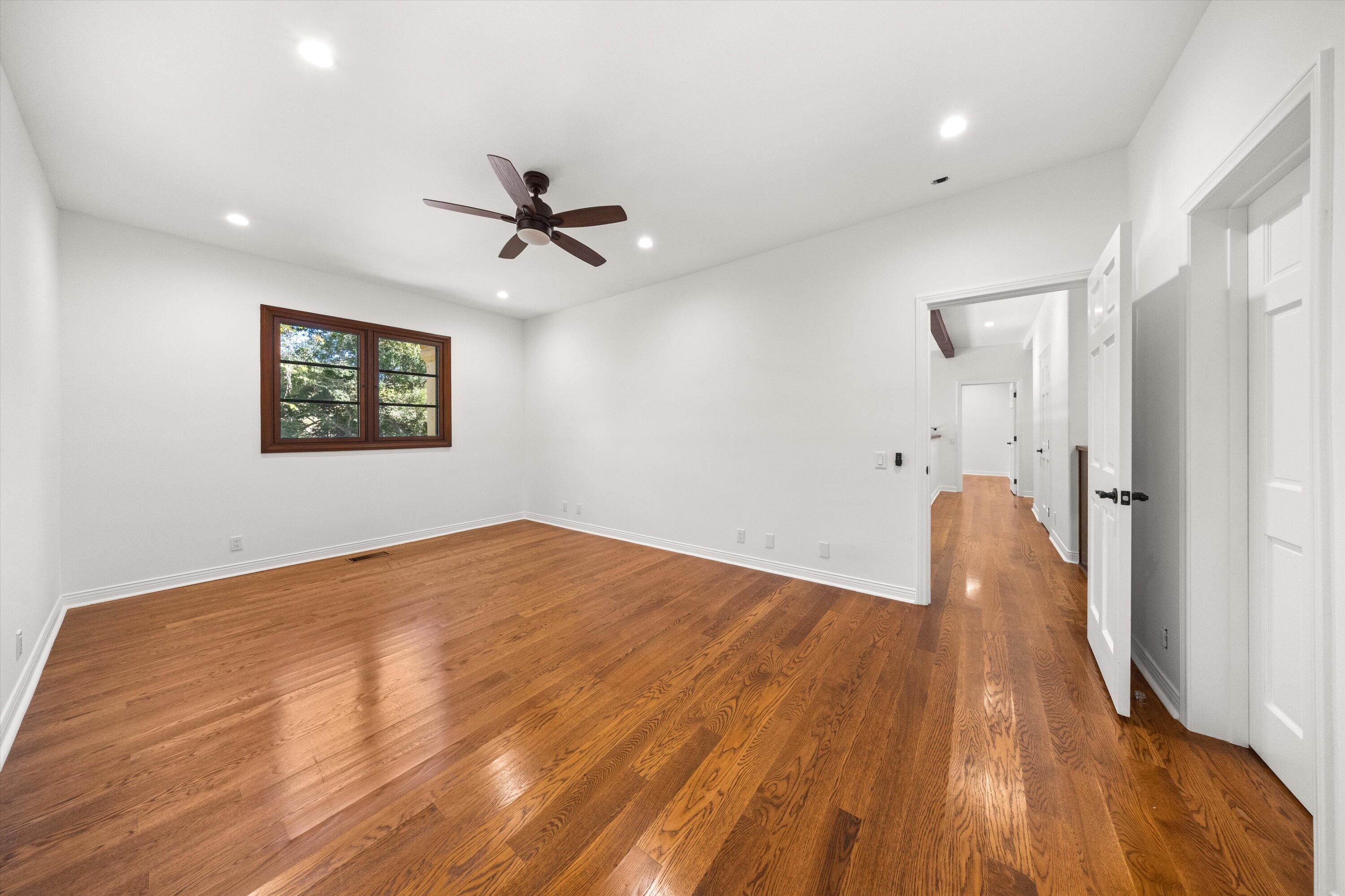 342 Sheffield Drive Montecito, CA 93108 - Photo 30 of 46 a view of a room with wooden floor and a ceiling fan