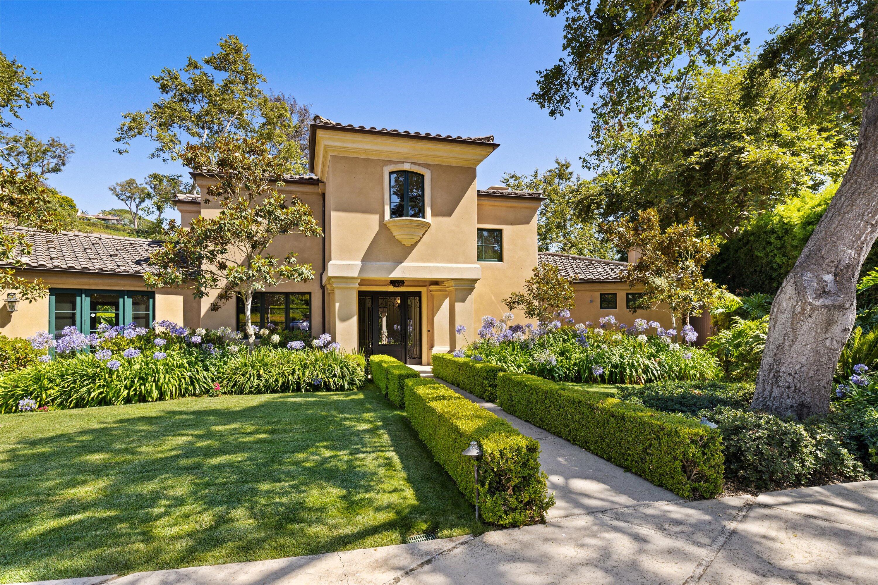 342 Sheffield Drive Montecito, CA 93108 - Photo 4 of 46 a front view of a house with a garden