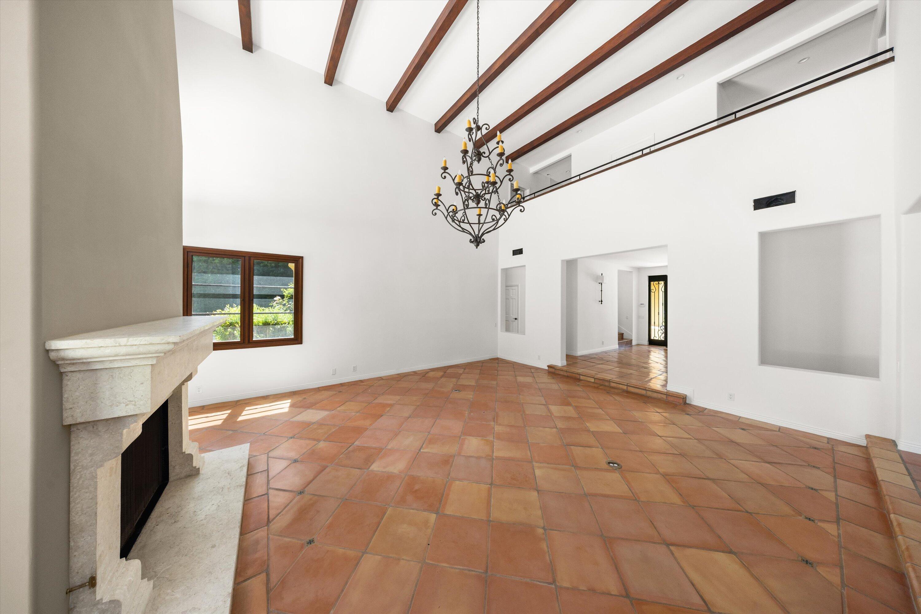 342 Sheffield Drive Montecito, CA 93108 - Photo 9 of 46 a view of a hallway with a chandelier