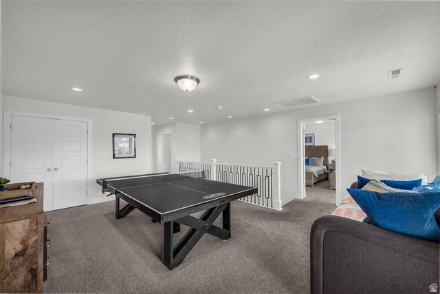 5010 Escapes Drive St. George, UT 84770 - Photo 17 of 46 Rec room featuring carpet floors, a textured ceiling, and recessed lighting