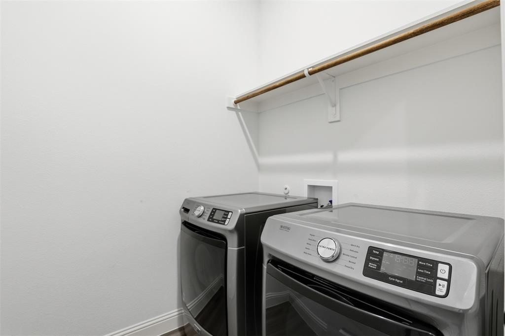 1101 Springfield Road Springtown, TX 76082 - Photo 24 of 32 a utility room with dryer and washer