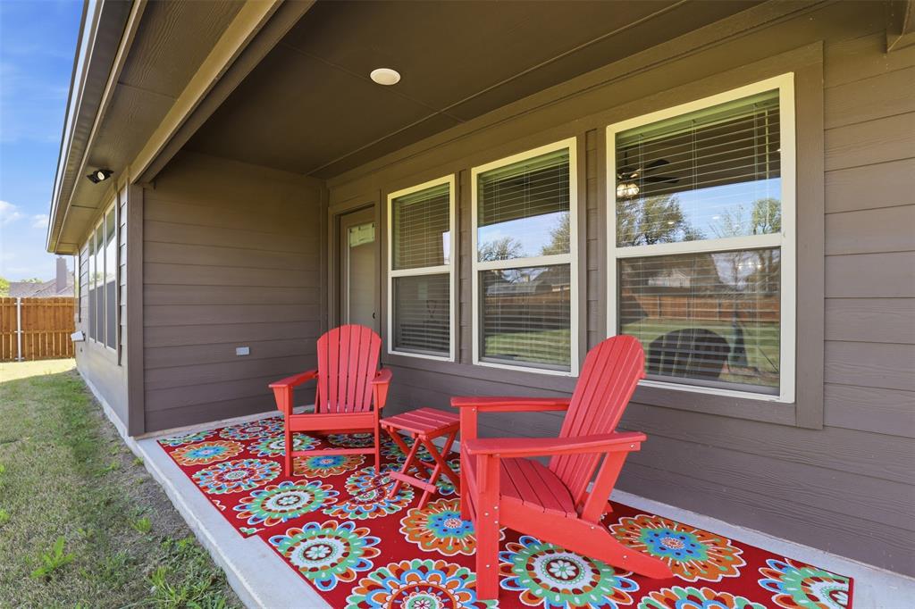 1101 Springfield Road Springtown, TX 76082 - Photo 28 of 32 a balcony with chairs and a table