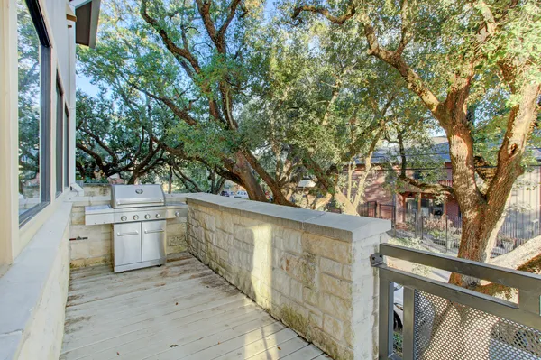 a view of a hardwood and floor to ceiling window