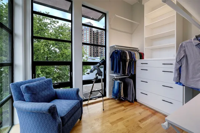 a livingroom with furniture and a window