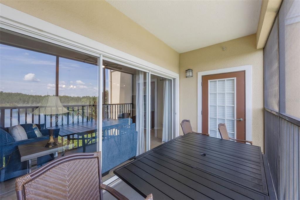 8774 Worldquest Boulevard, Unit 7404 Orlando, FL 32821 - Photo 28 of 55 a view of a living room and wooden floor