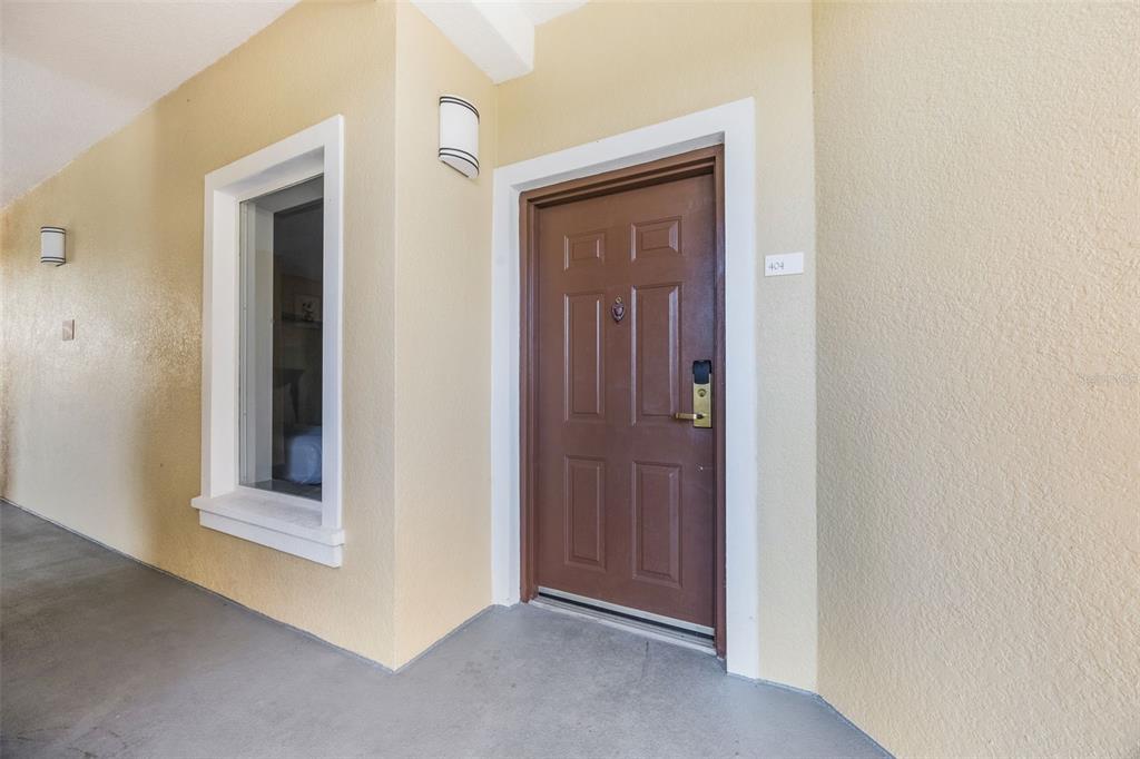 8774 Worldquest Boulevard, Unit 7404 Orlando, FL 32821 - Photo 3 of 55 a view of front door