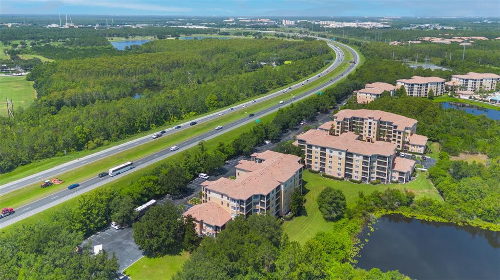 8774 Worldquest Boulevard, Unit 7404 Orlando, FL 32821 - Photo 33 of 55 an aerial view of a city