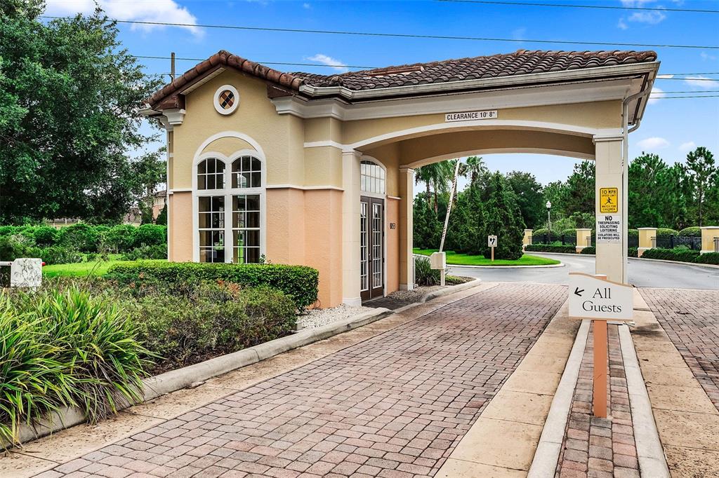 8774 Worldquest Boulevard, Unit 7404 Orlando, FL 32821 - Photo 36 of 55 a view of yellow house with a outdoor view