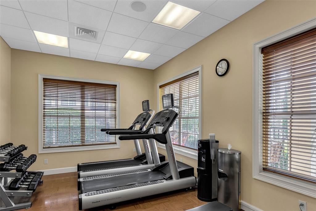 8774 Worldquest Boulevard, Unit 7404 Orlando, FL 32821 - Photo 43 of 55 a view of a workspace with furniture and a window