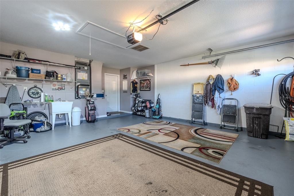 15143 Southwest 14th Avenue Road Ocala, FL 34473 - Photo 38 of 53 a room with gym equipment and a mirror