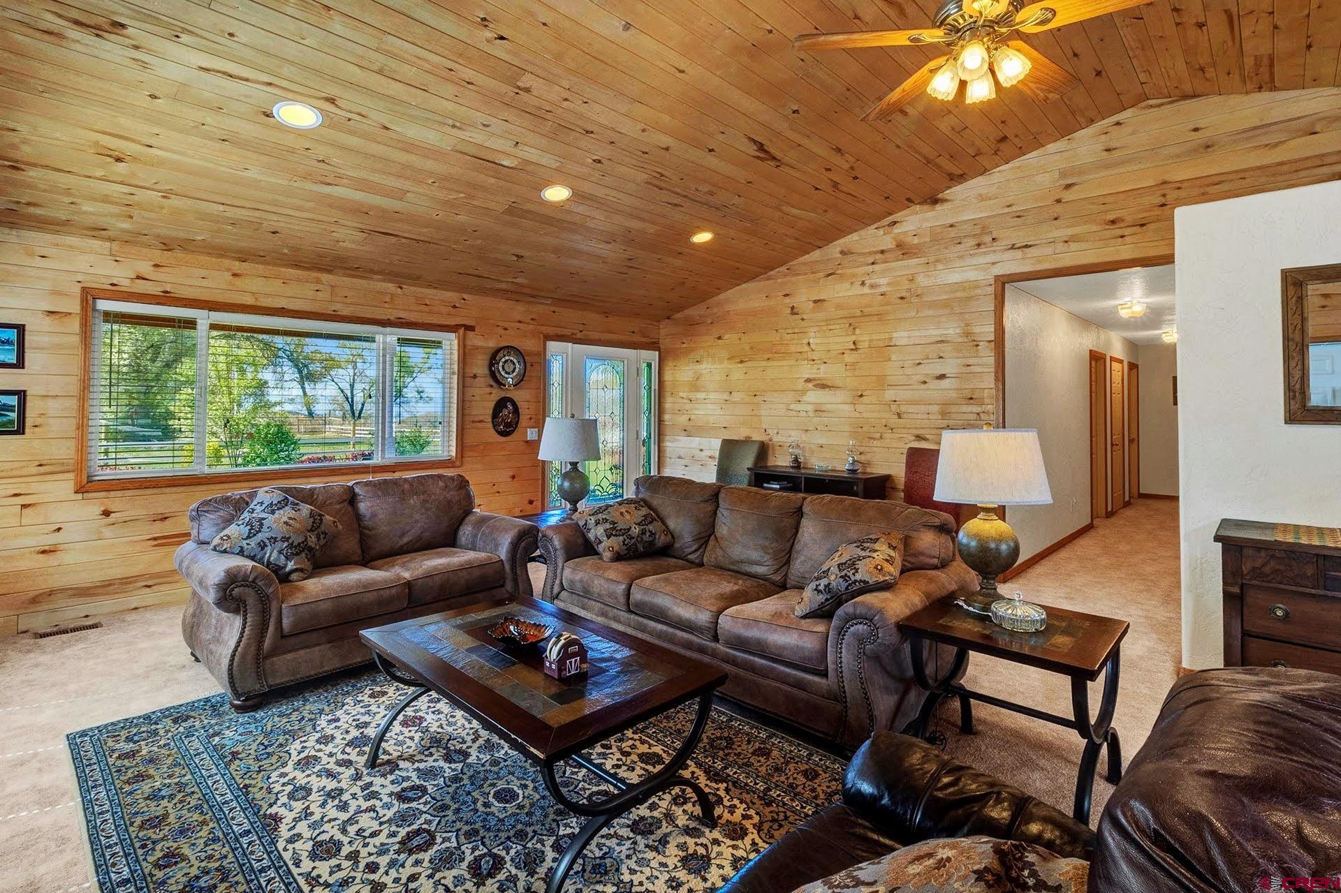 1036 East Main Street Cedaredge, CO 81413 - Photo 15 of 36 a living room with furniture and a large window