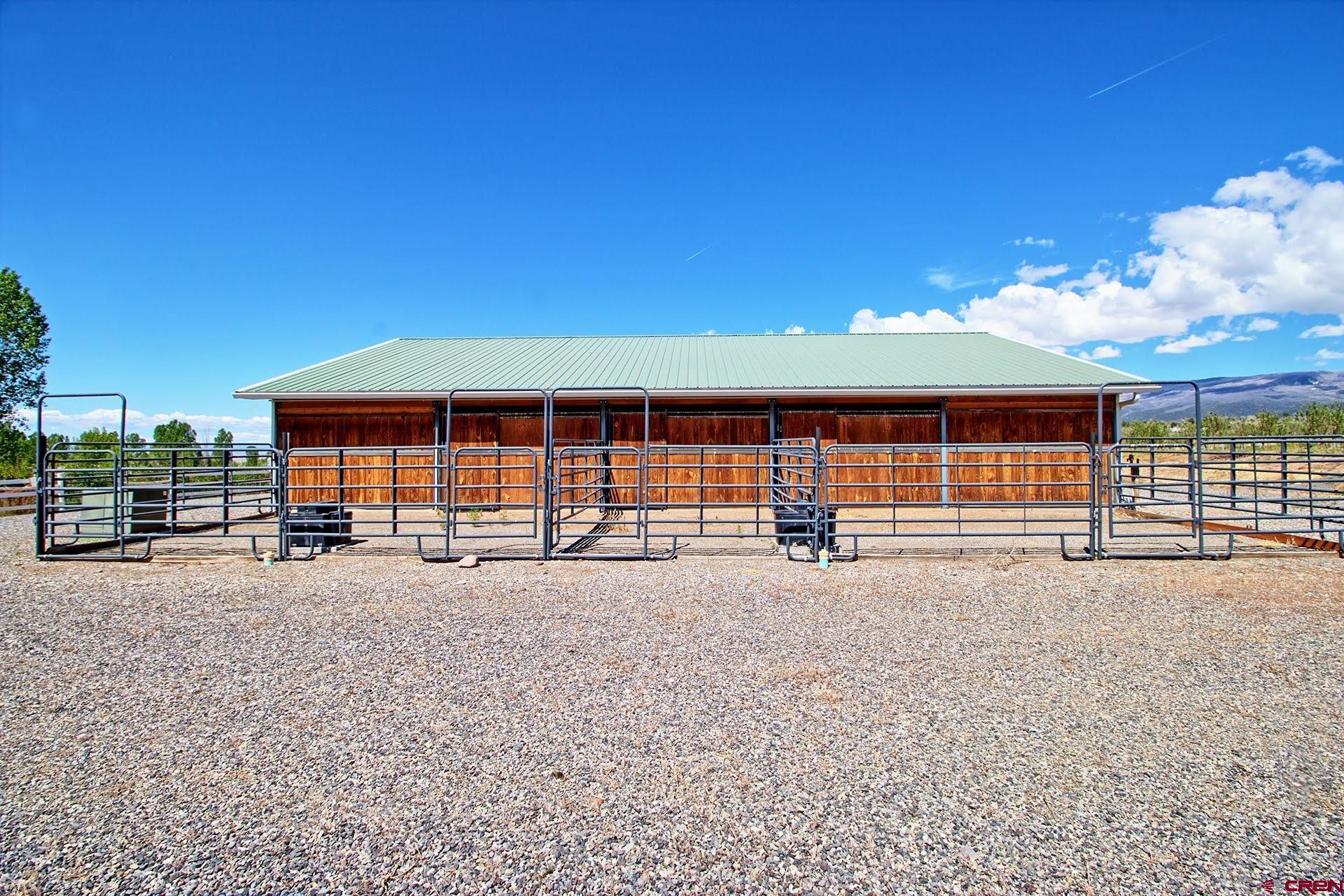 1036 East Main Street Cedaredge, CO 81413 - Photo 27 of 36 a view of a house with backyard and porch
