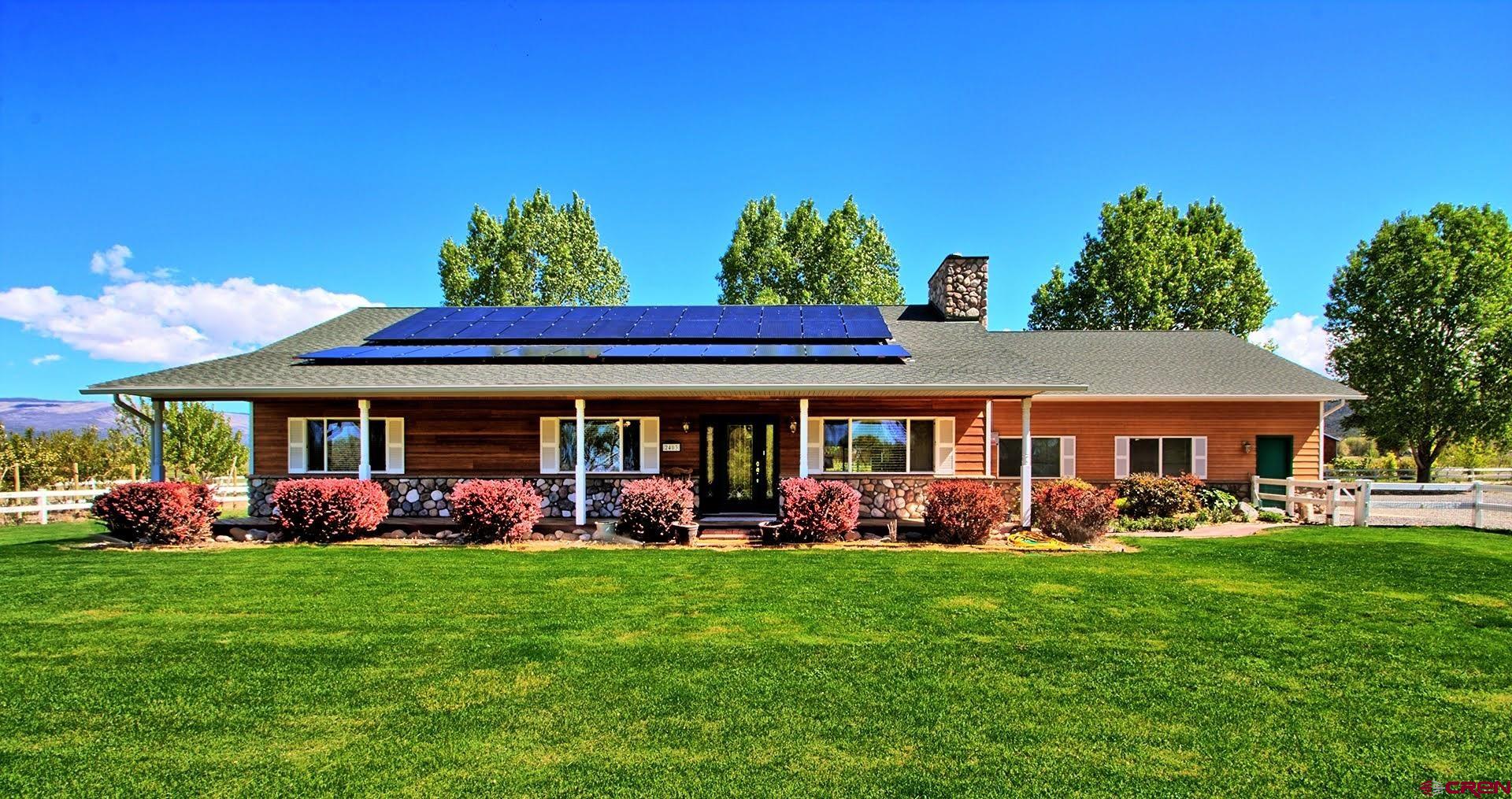1036 East Main Street Cedaredge, CO 81413 - Photo 9 of 36 front view of a house with a big yard