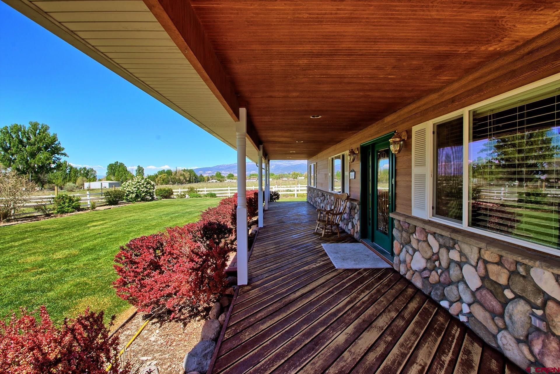1036 East Main Street Cedaredge, CO 81413 - Photo 10 of 36 a view of a patio with wooden floor