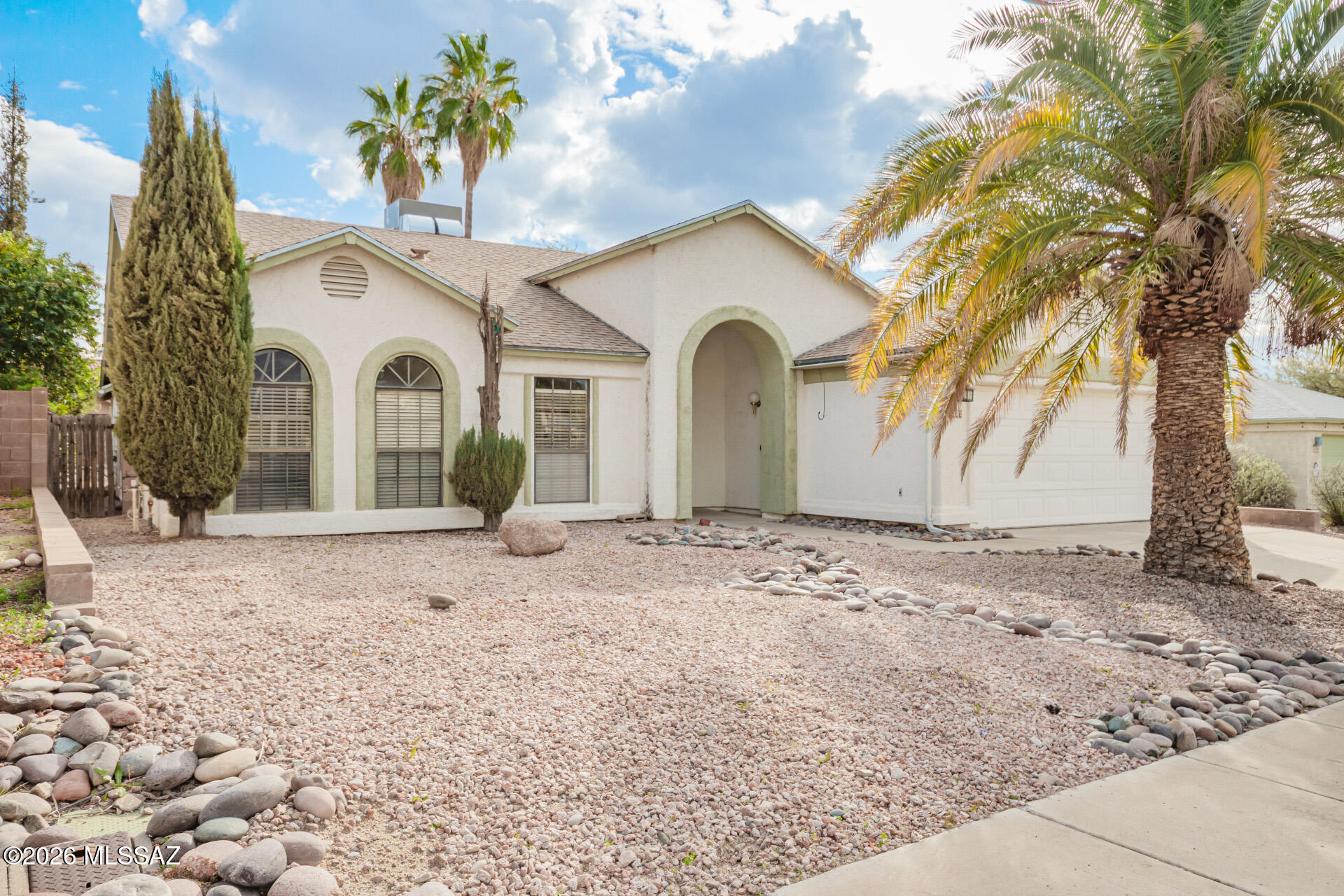5331 West Eaglestone Loop Tucson, AZ 85742 - Photo 3 of 35 a view of a house with a snow in the background