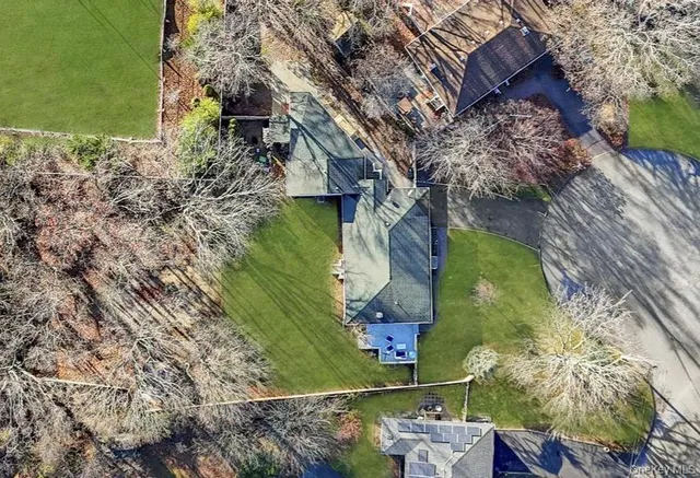 a view of swimming pool with a yard