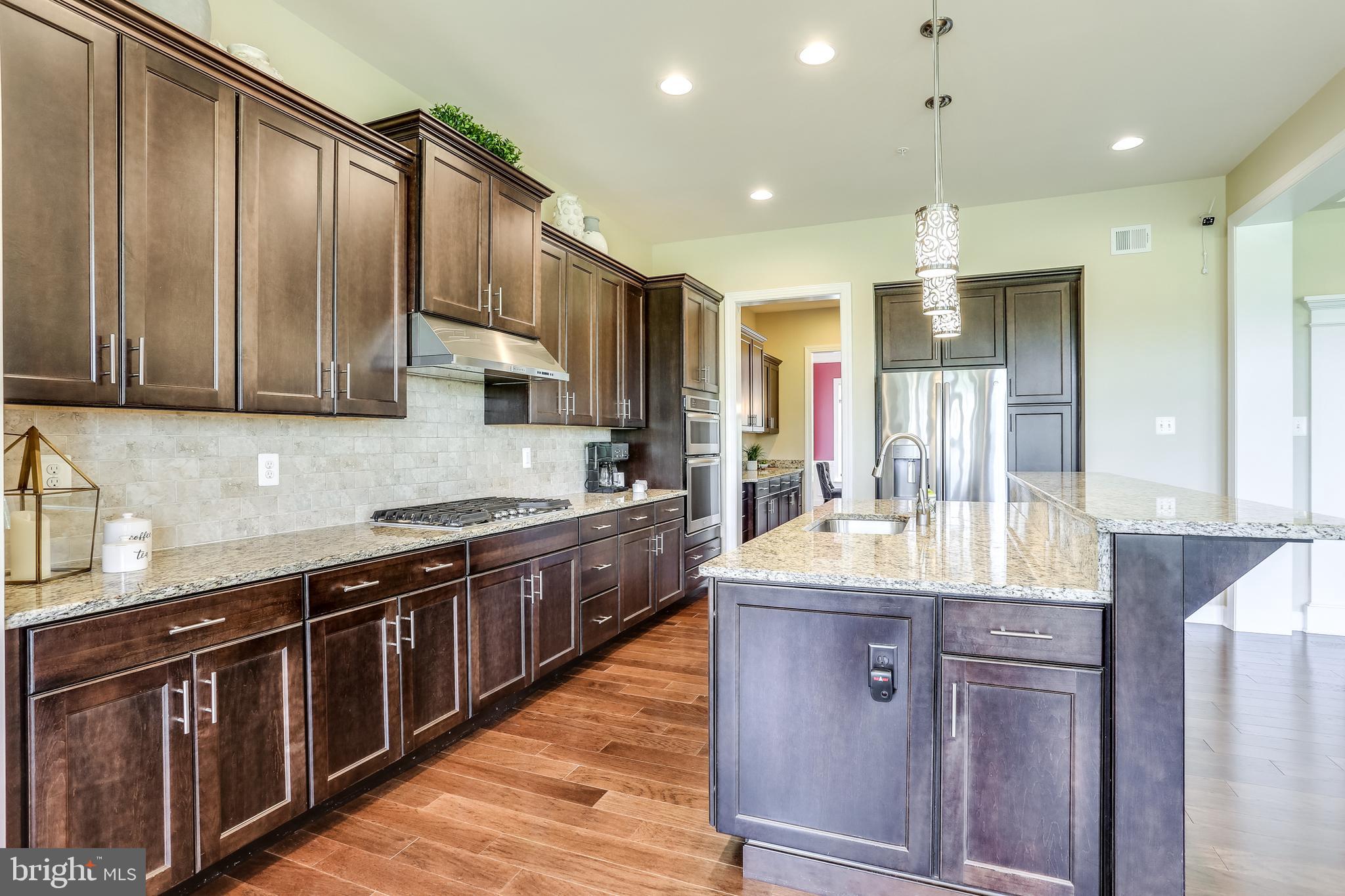7772 Elmwood Road Fulton, MD 20759 - Photo 6 of 84 Kitchen leading to Butlers Pantry