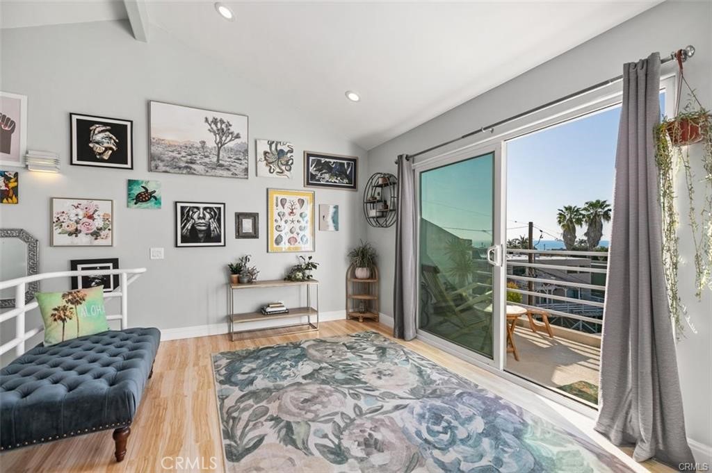 33772 Copper Lantern Street, Unit C Dana Point, CA 92629 - Photo 11 of 45 a bedroom with furniture and a window