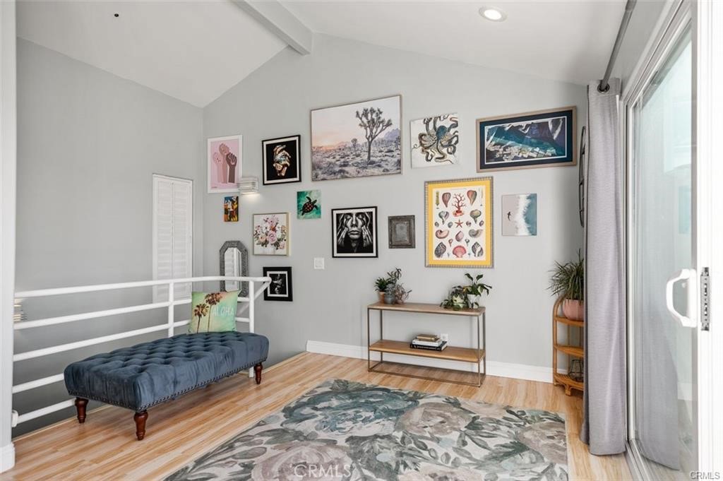 33772 Copper Lantern Street, Unit C Dana Point, CA 92629 - Photo 13 of 45 a living room with furniture and wooden floor