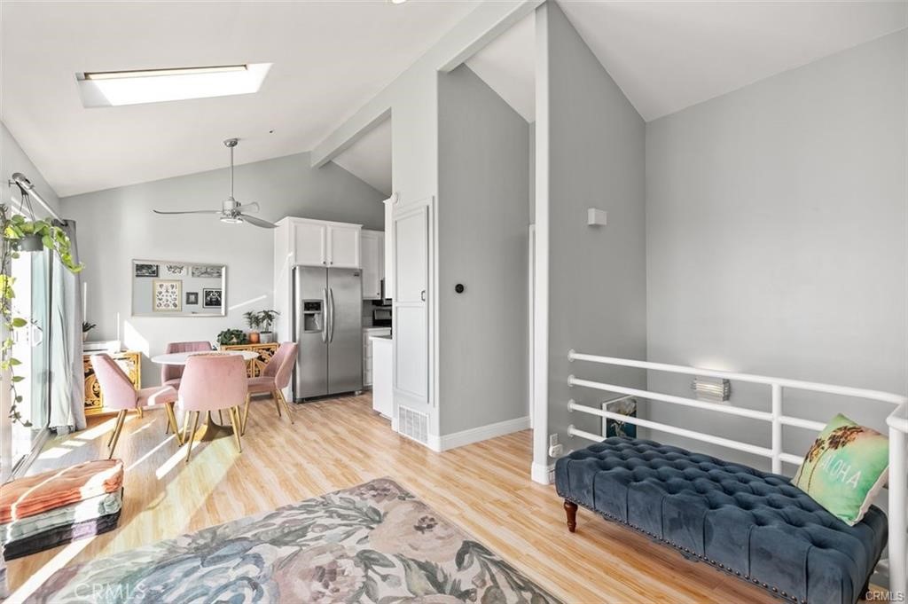 33772 Copper Lantern Street, Unit C Dana Point, CA 92629 - Photo 15 of 45 a living room with furniture and a rug
