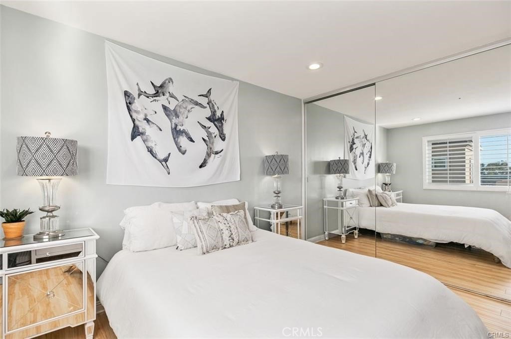 33772 Copper Lantern Street, Unit C Dana Point, CA 92629 - Photo 33 of 45 a bedroom with a bed and a couch