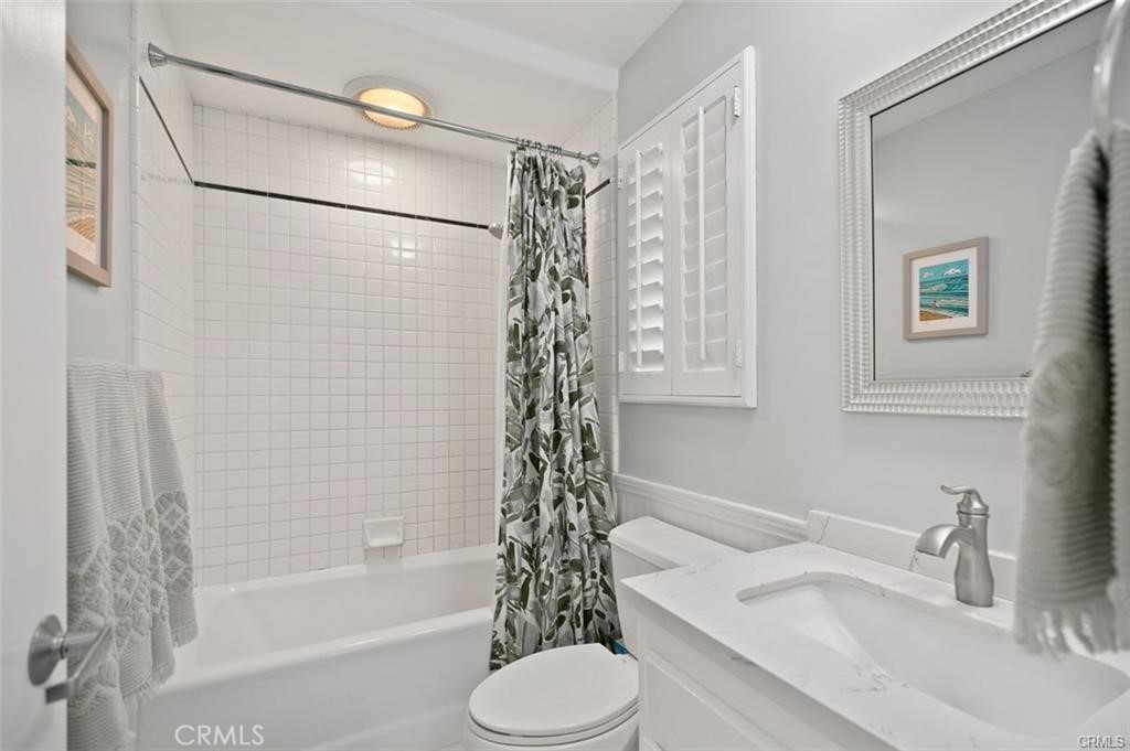 33772 Copper Lantern Street, Unit C Dana Point, CA 92629 - Photo 34 of 45 a bathroom with a sink toilet and shower